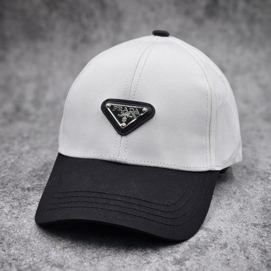 Prada Triangle Cap – White & Black Edition